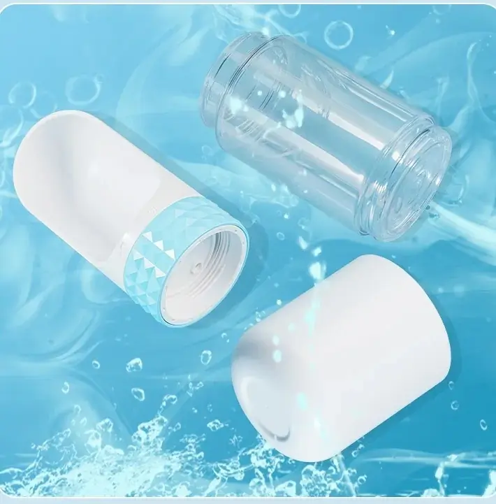 The bottle separated into its three parts, rinsed in water.